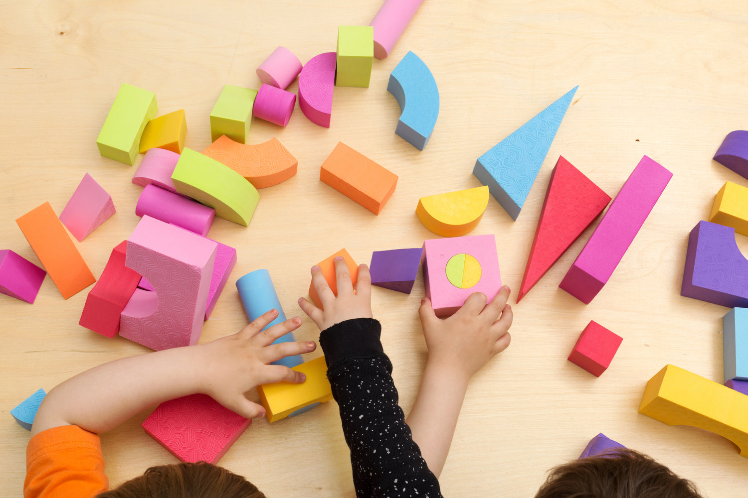 Children playing with building blocks